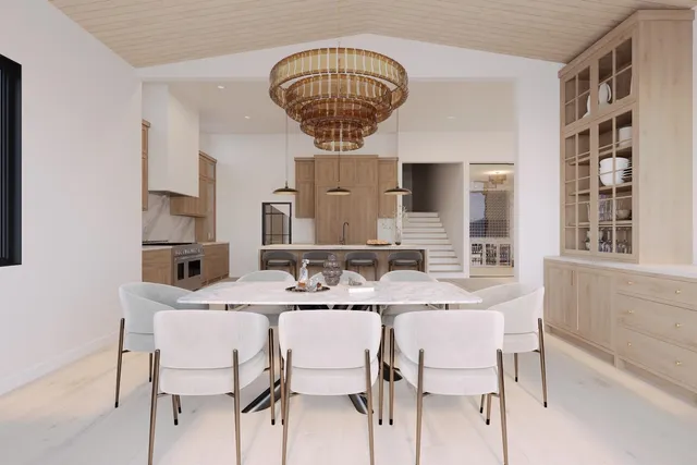 a view of dining room and kitchen island with furniture