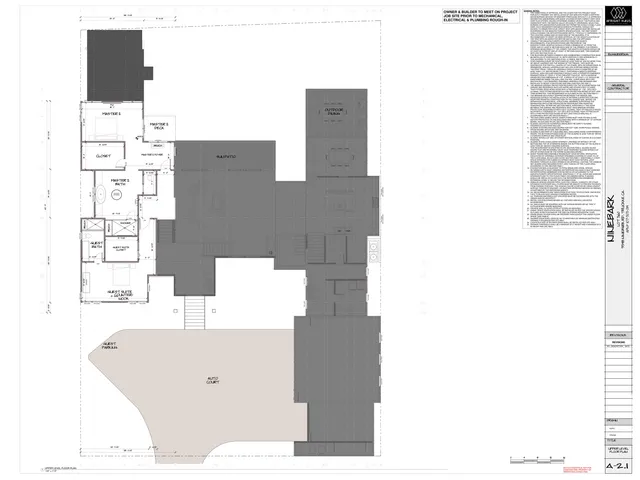 a bathroom with a bathtub sink and mirror