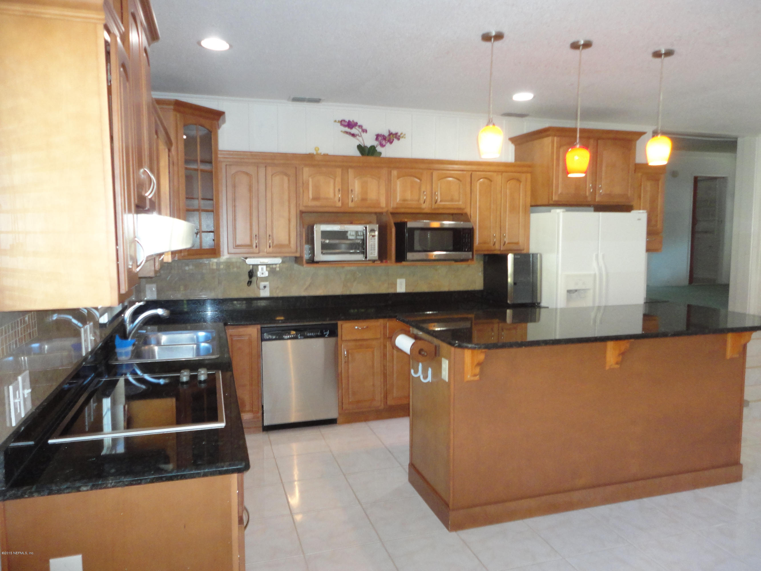 5715 Hickson Road Jacksonville, FL 32216 - Photo 10 of 23 Another view of the lovely kitchen.