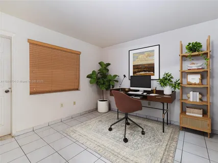 a workspace with furniture and a potted plant