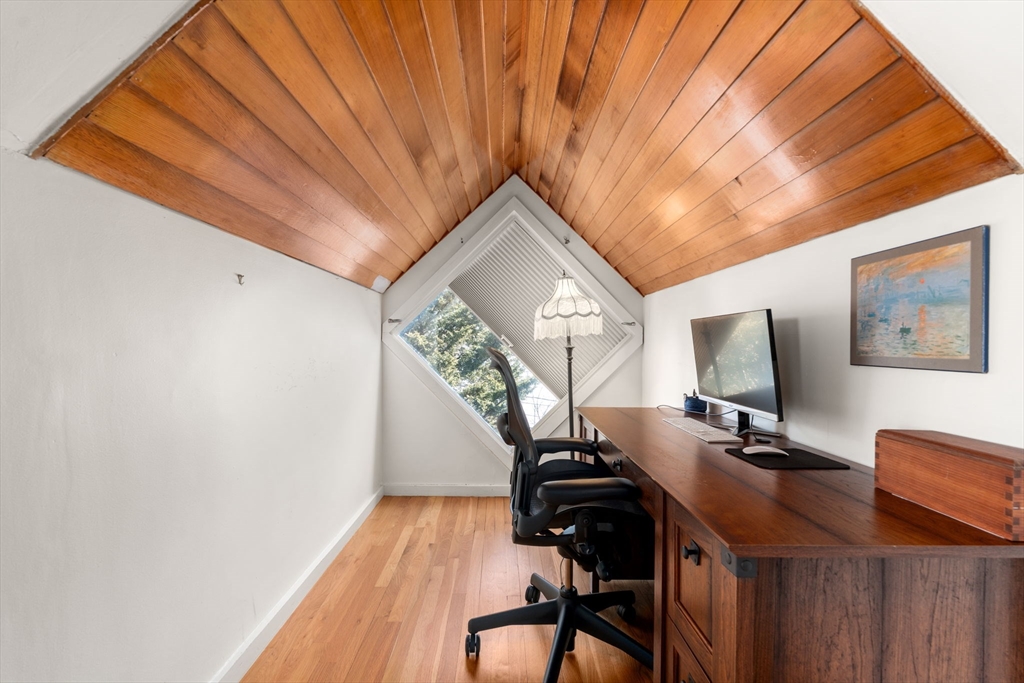 25 Perry Street, Unit 25 Somerville, MA 02143 - Photo 16 of 29 a view of workspace with wooden floor windows