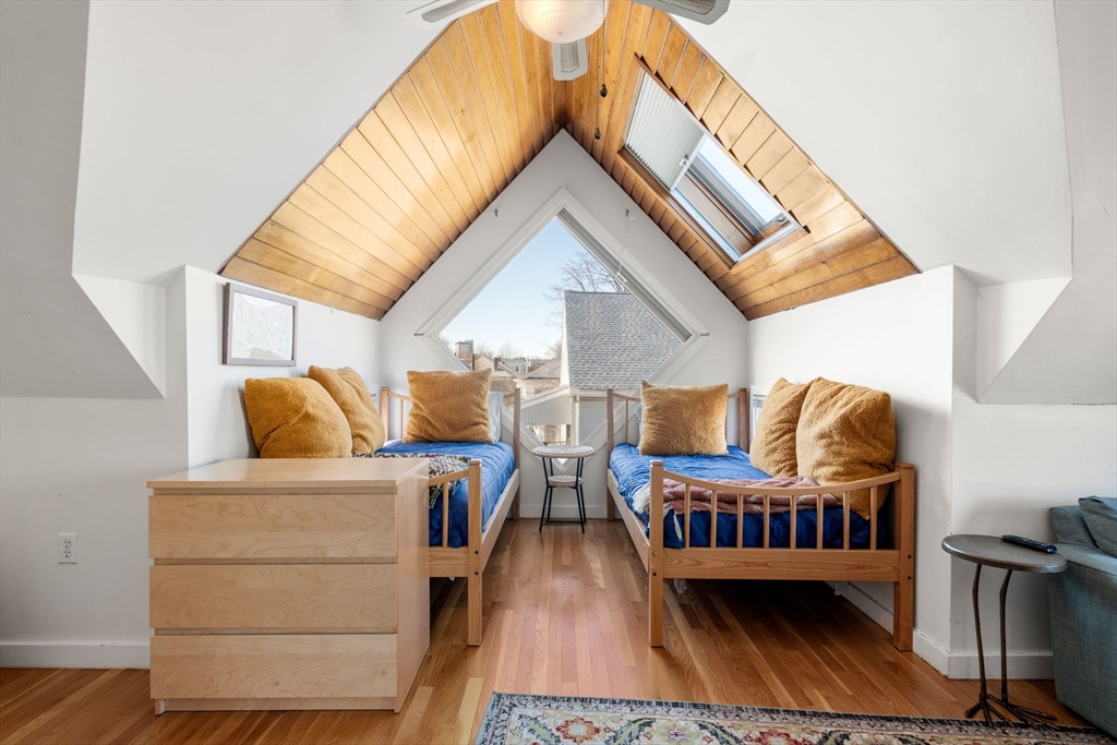 25 Perry Street, Unit 25 Somerville, MA 02143 - Photo 19 of 29 a view of a chairs and table on the deck