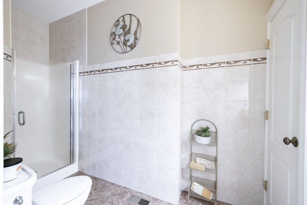 114 Upper Gore Road Webster, MA 01570 - Photo 14 of 40 a bathroom with a shower a toilet and a shower