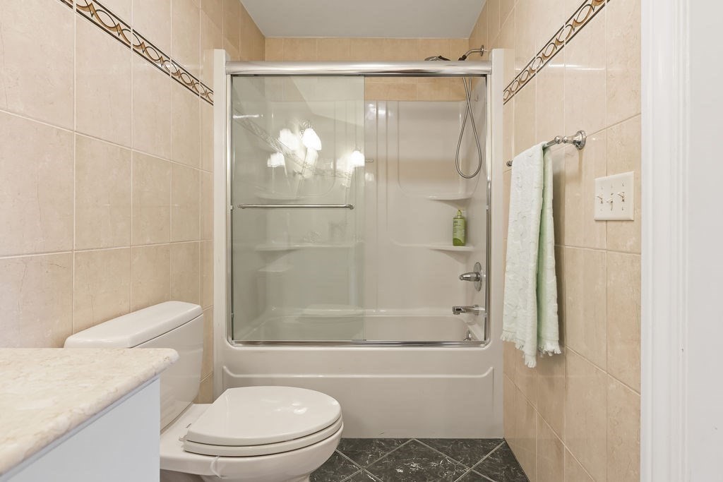 114 Upper Gore Road Webster, MA 01570 - Photo 24 of 40 a bathroom with a shower and a toilet