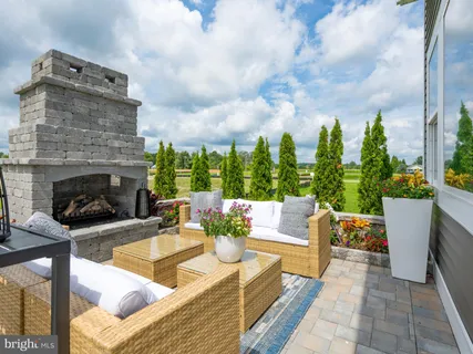 a outdoor living space with furniture and garden view