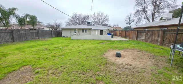 an aerial view of a house with pool