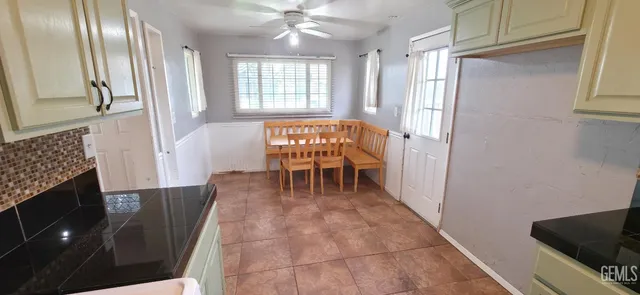 a view of a livingroom with furniture and window