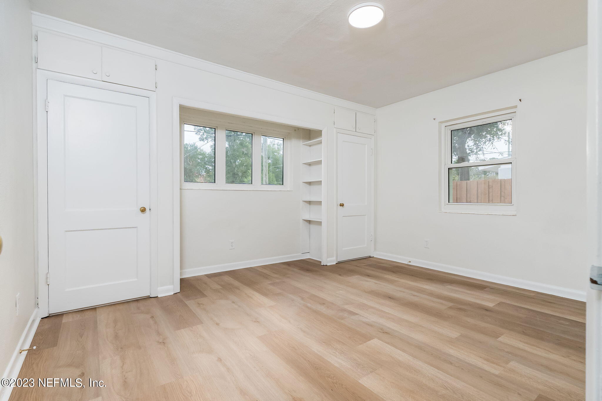 6236 Suwanee Road Jacksonville, FL 32217 - Photo 24 of 38 a view of an empty room with a window