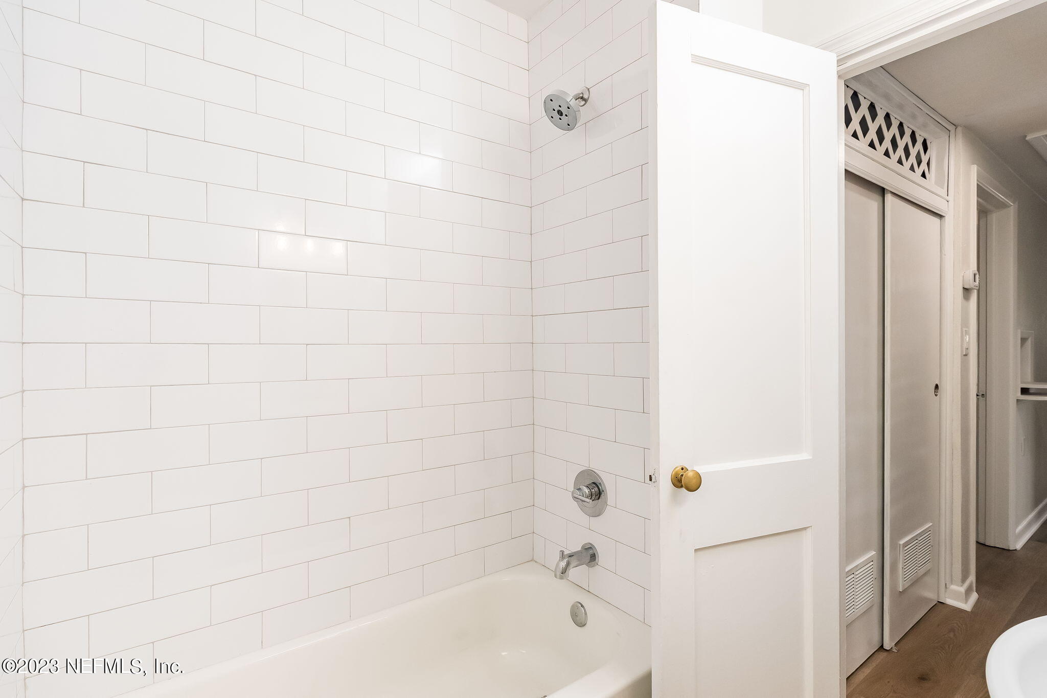 6236 Suwanee Road Jacksonville, FL 32217 - Photo 28 of 38 a bathroom with a bathtub and a shower