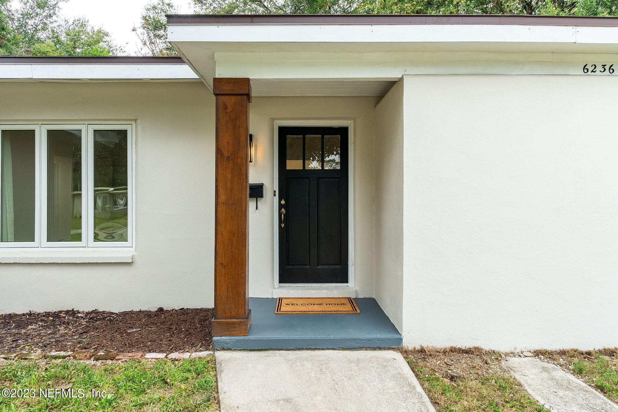 6236 Suwanee Road Jacksonville, FL 32217 - Photo 6 of 38 a front view of a house with a garage