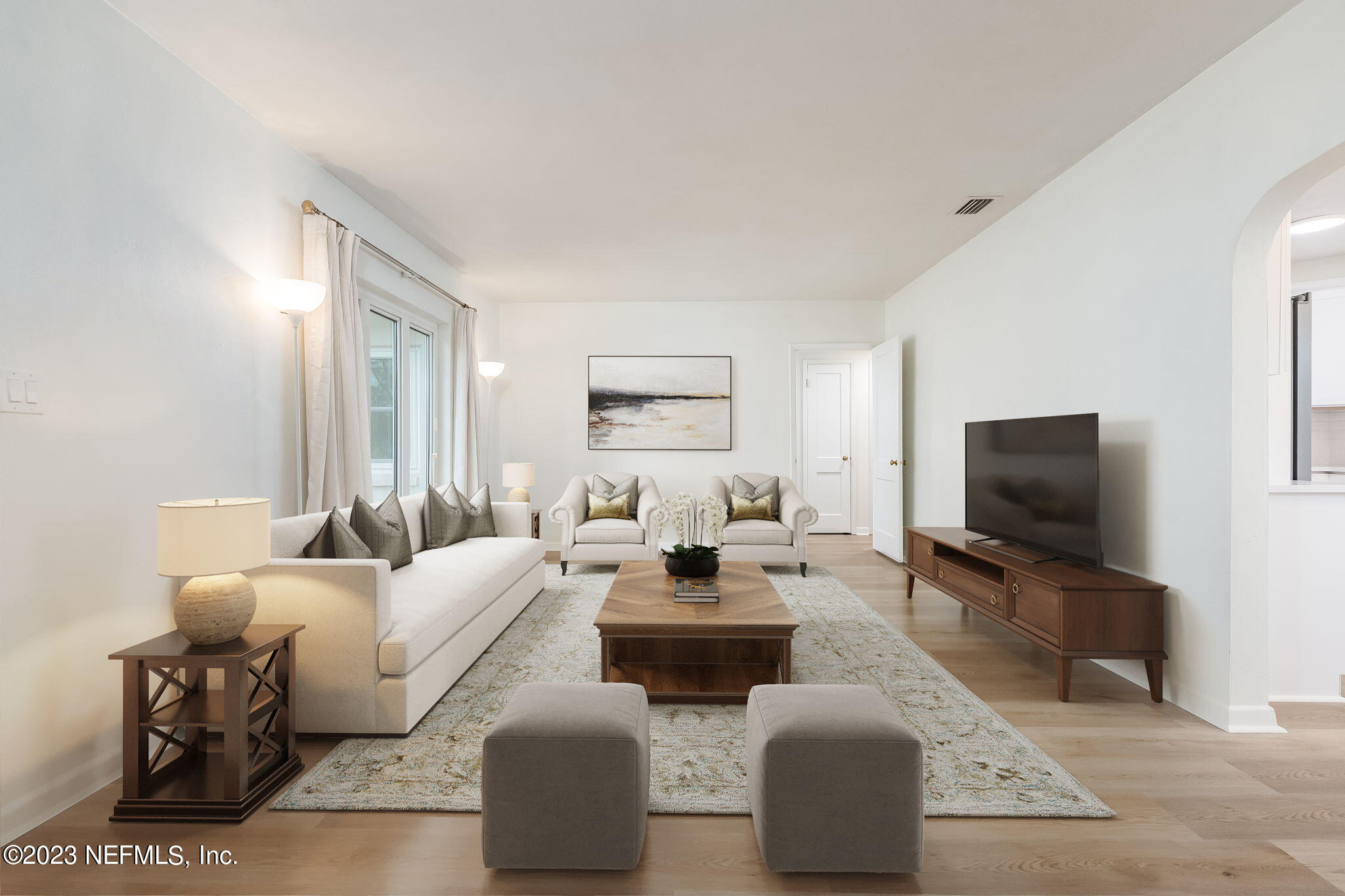 6236 Suwanee Road Jacksonville, FL 32217 - Photo 7 of 38 a living room with furniture and a flat screen tv