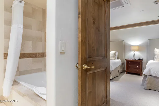 a view of a bathroom with a bathtub