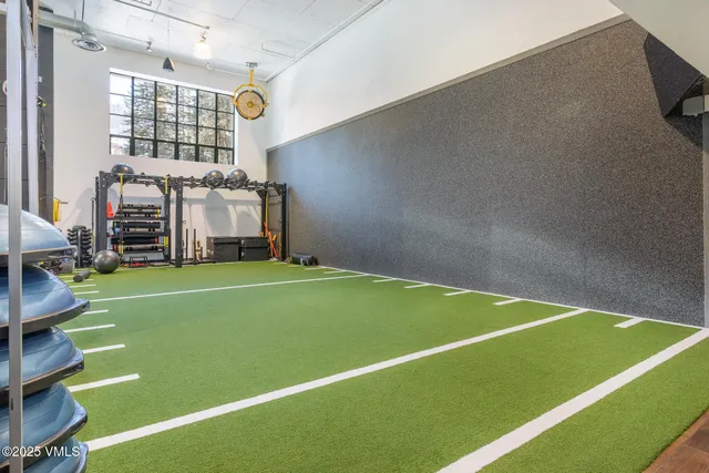 a view of a room with gym equipment