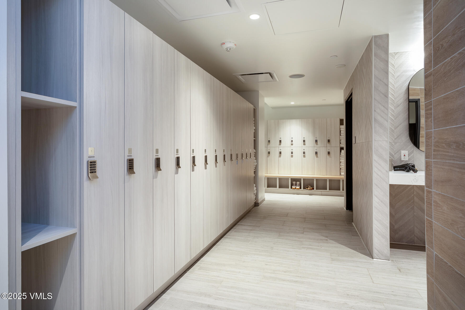 352 East Meadow Drive, Unit J Vail, CO 81657 - Photo 29 of 47 a view of a hallway with wooden floor