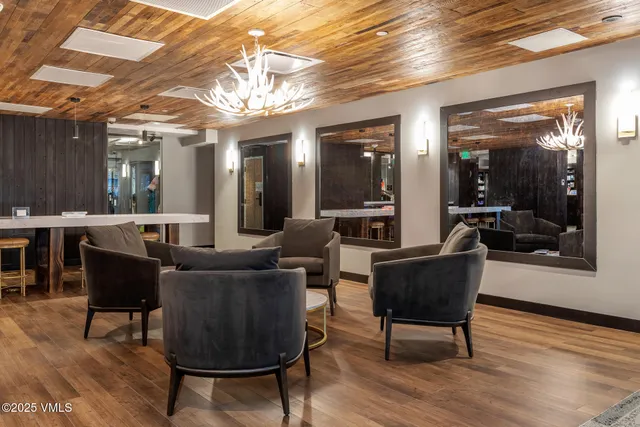 a room with lots of furniture and a window