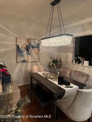 a living room with a couch and a flat screen tv