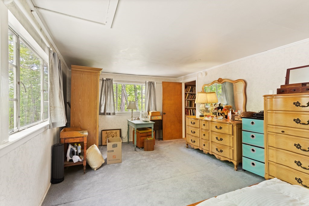 73 Old County Road Lincoln, MA 01773 - Photo 13 of 15 a bedroom with furniture and a window