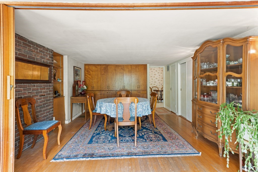 73 Old County Road Lincoln, MA 01773 - Photo 5 of 15 a living room with furniture rug and wooden floor