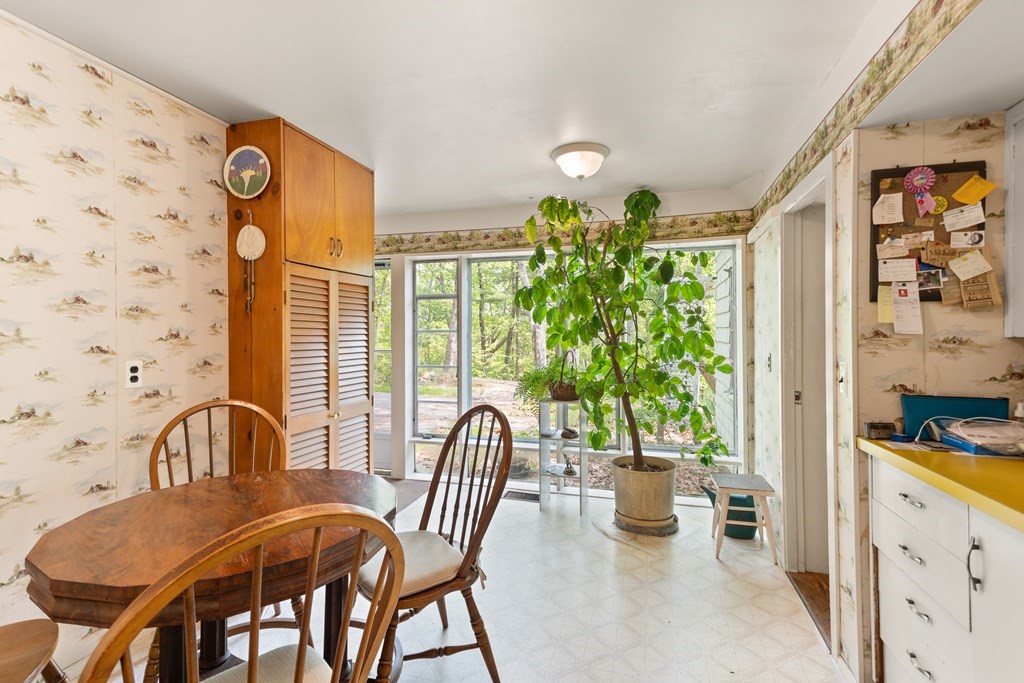 73 Old County Road Lincoln, MA 01773 - Photo 7 of 15 a view of a dining room with furniture window and outside view