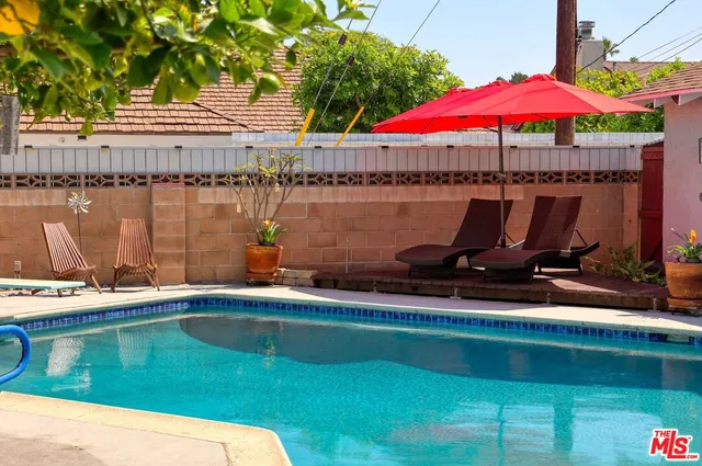 a view of a house with patio outdoor seating