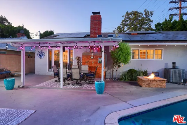 a view of a chairs and table in the terrace