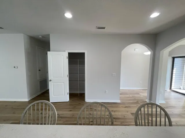 a view of a kitchen with microwave and stove