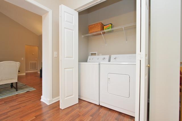 7588 Cherokee Hills Road Fairview, TN 37062 - Photo 15 of 18 A utility closet with space for a full size washer/dryer is conveniently located near the main living areas.