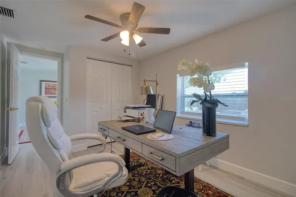 a view of a porch with furniture