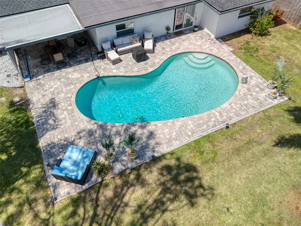 a view of outdoor space yard and swimming pool