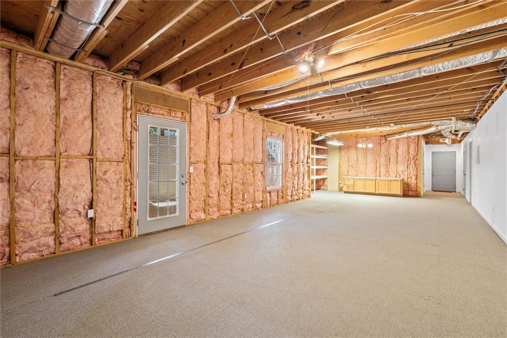 1030 Lakeview Parkway Villa Rica, GA 30180 - Photo 24 of 46 a view of empty room with wooden walls