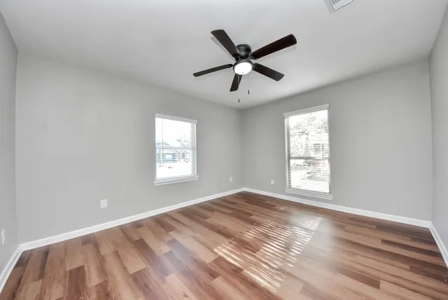 a view of an empty room and window