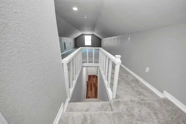 a view of a livingroom with a staircase