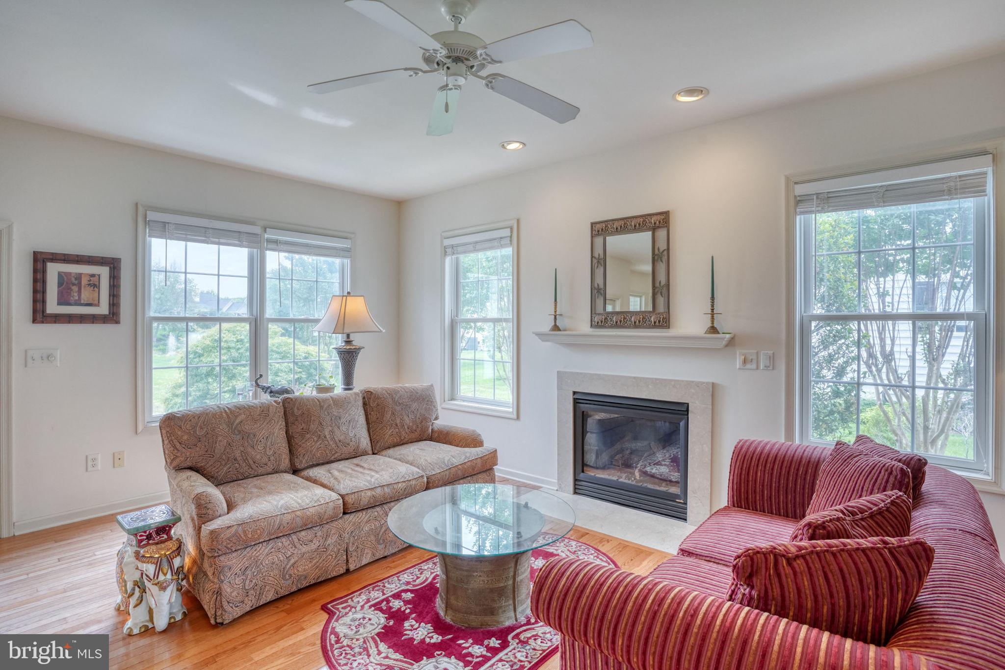 36 Kenmare Way Rehoboth Beach, DE 19971 - Photo 26 of 62 Gas fireplace warms the living room.