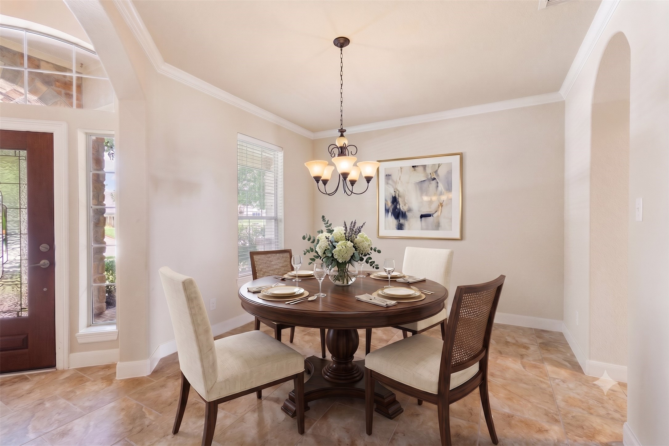 19222 Senterra Lakes Boulevard Spring, TX 77379 - Photo 43 of 45 An expansive dining room or formal living area adjacent to the foyer, boasting beautiful arched entries. *This photo has been virtually staged.