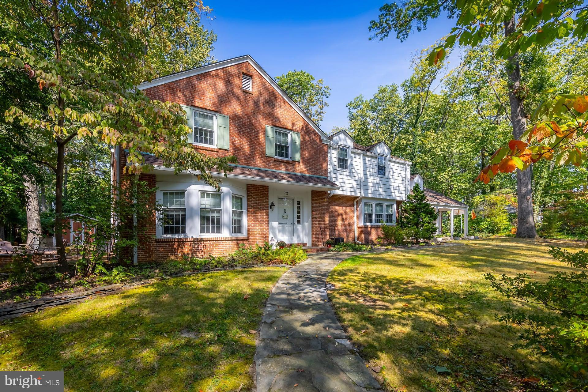 a view of a building with a yard