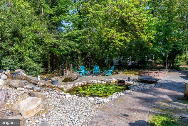 a view of swimming pool with lounge chair
