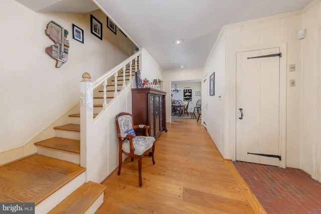 a living room with furniture fireplace and flat screen tv