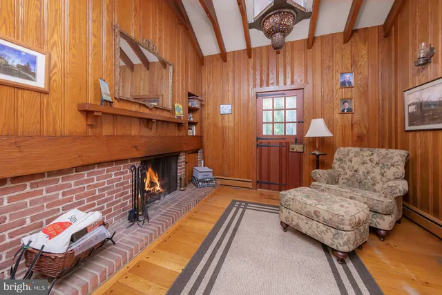a room with furniture and a fireplace