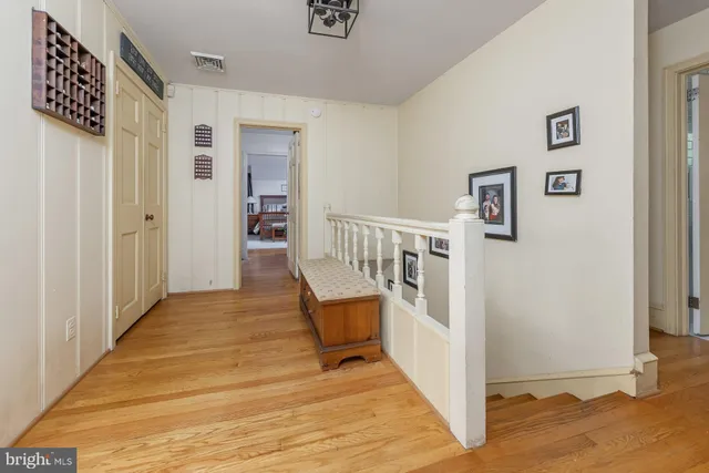 a view of a living room and hardwood floor