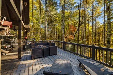 a view of balcony with wooden floor