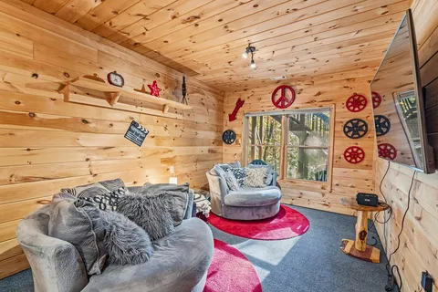 a bedroom with a bed and a couch