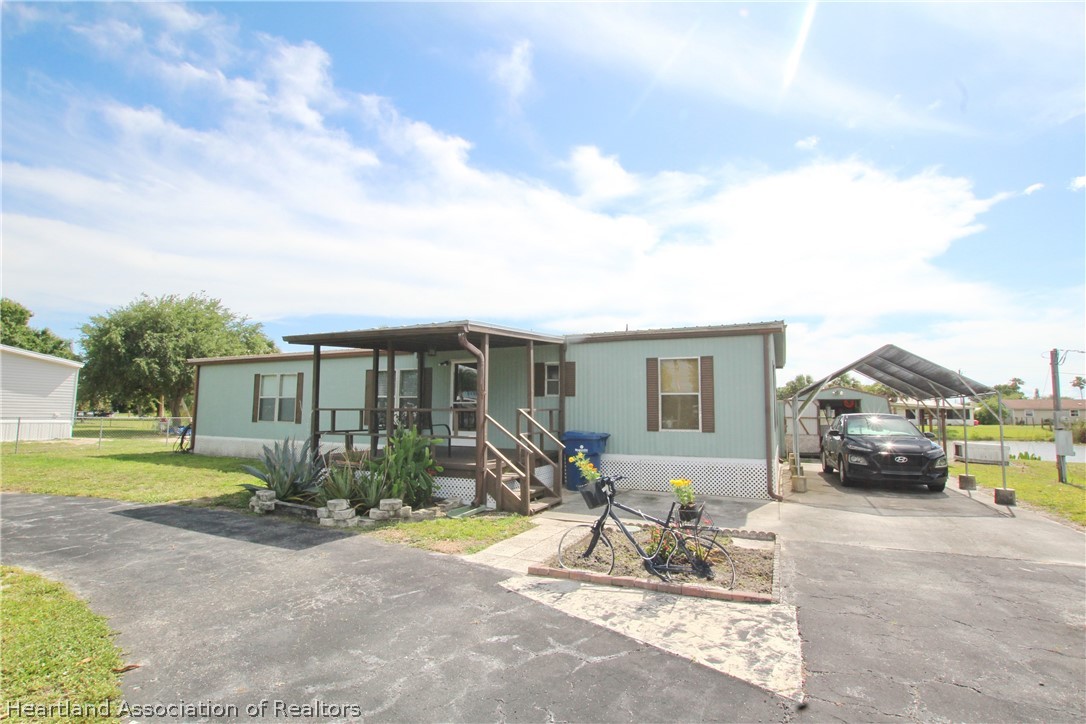1272 Chobee Loop Okeechobee, FL 34974 - Photo 1 of 32