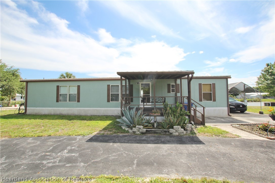 1272 Chobee Loop Okeechobee, FL 34974 - Photo 2 of 32