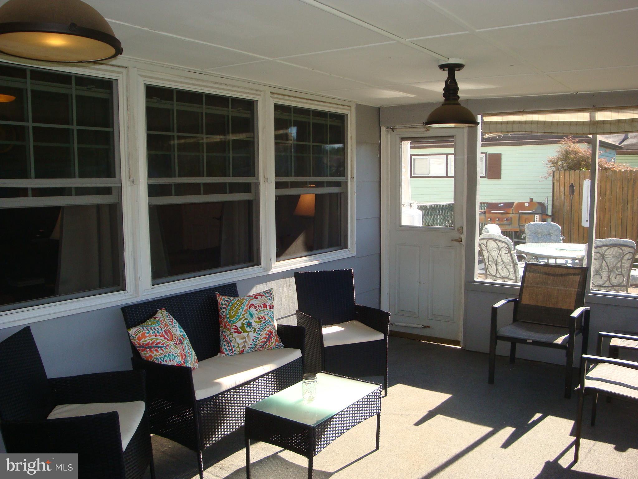 71 Incurve Road Levittown, PA 19057 - Photo 23 of 32 Screened 3 Season Room overlooks yard