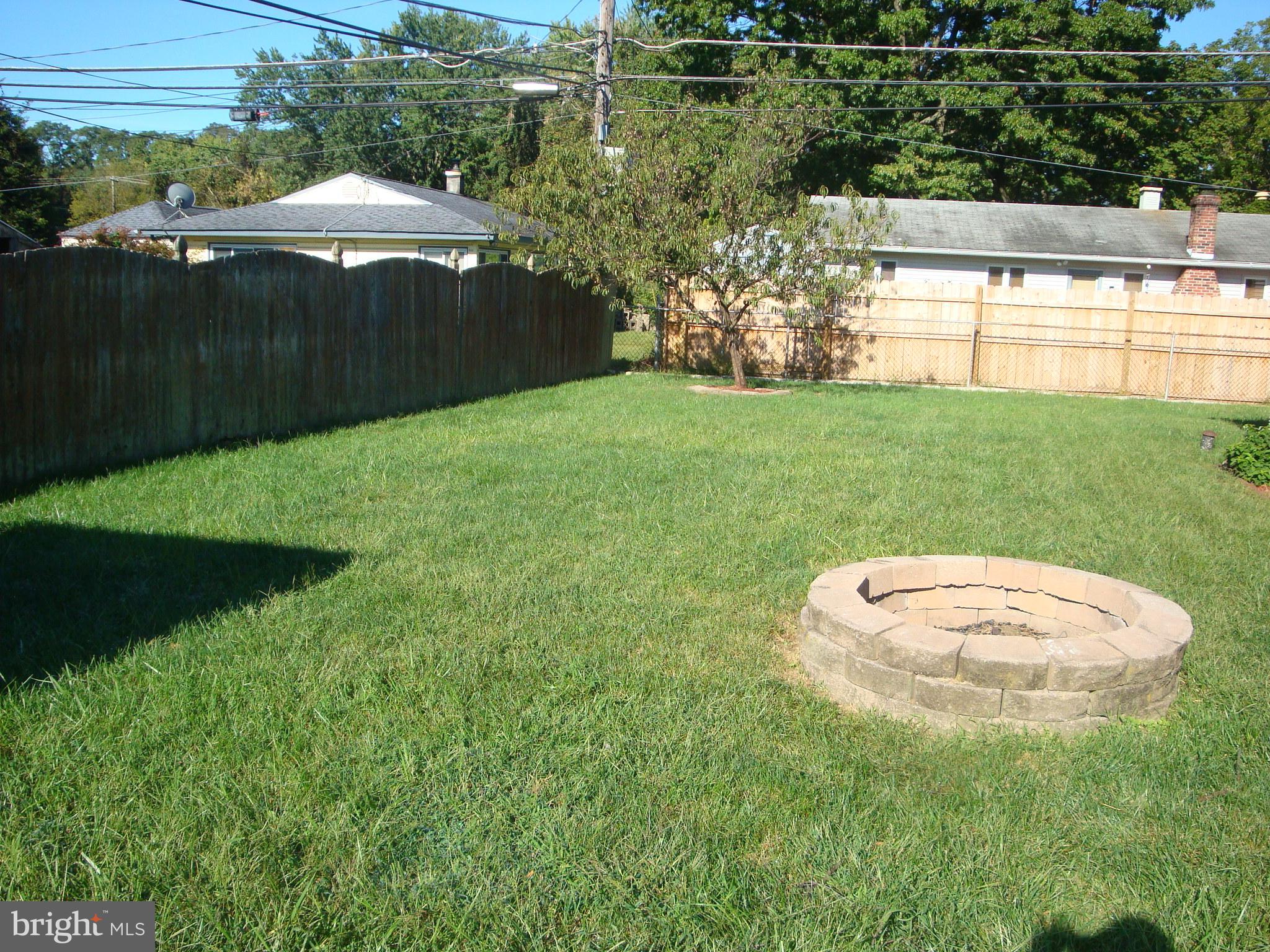 71 Incurve Road Levittown, PA 19057 - Photo 26 of 32 Large level yard with Firepit