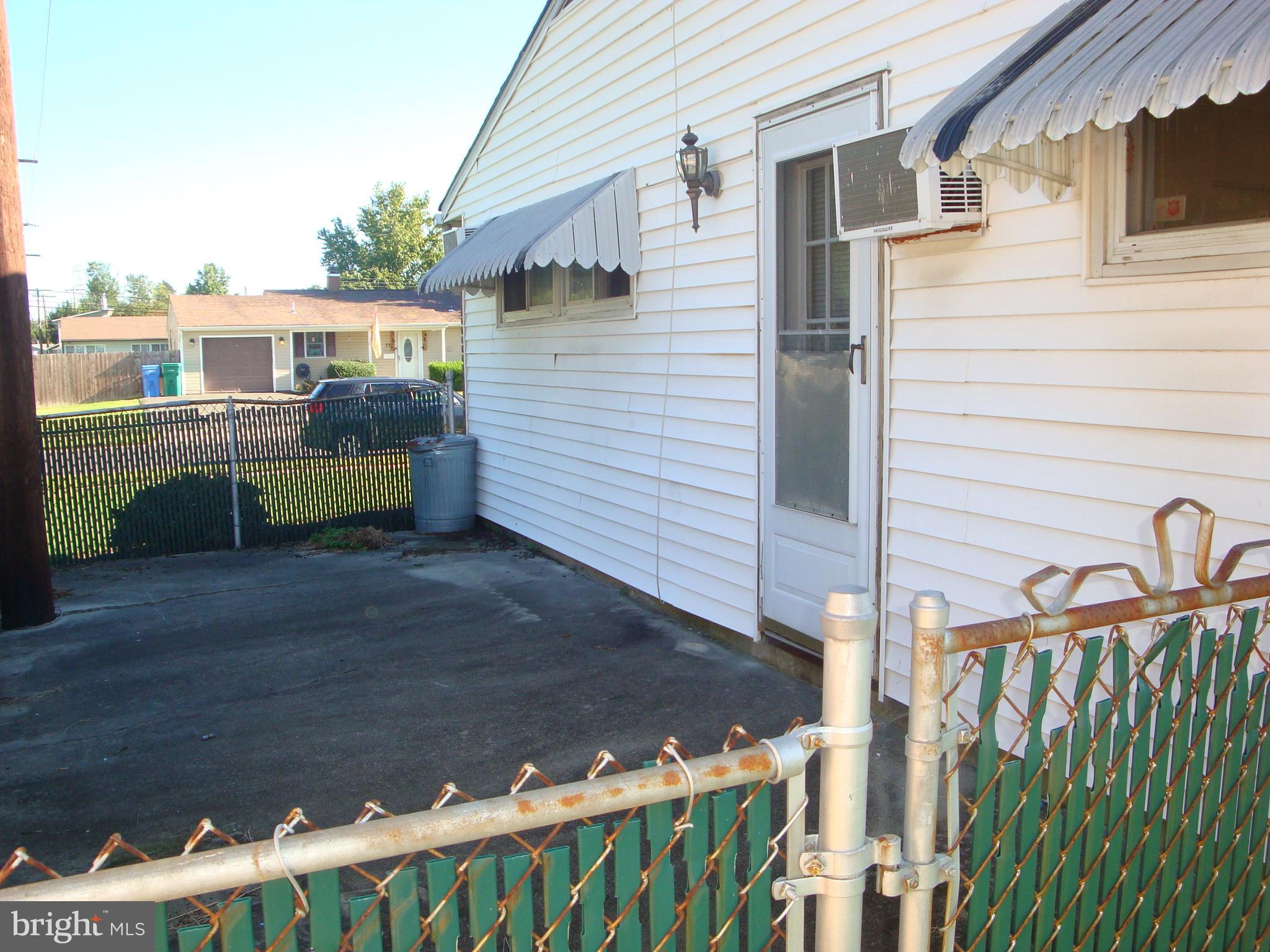 71 Incurve Road Levittown, PA 19057 - Photo 30 of 32 Small enclosed patio area off of 2nd Bedroom