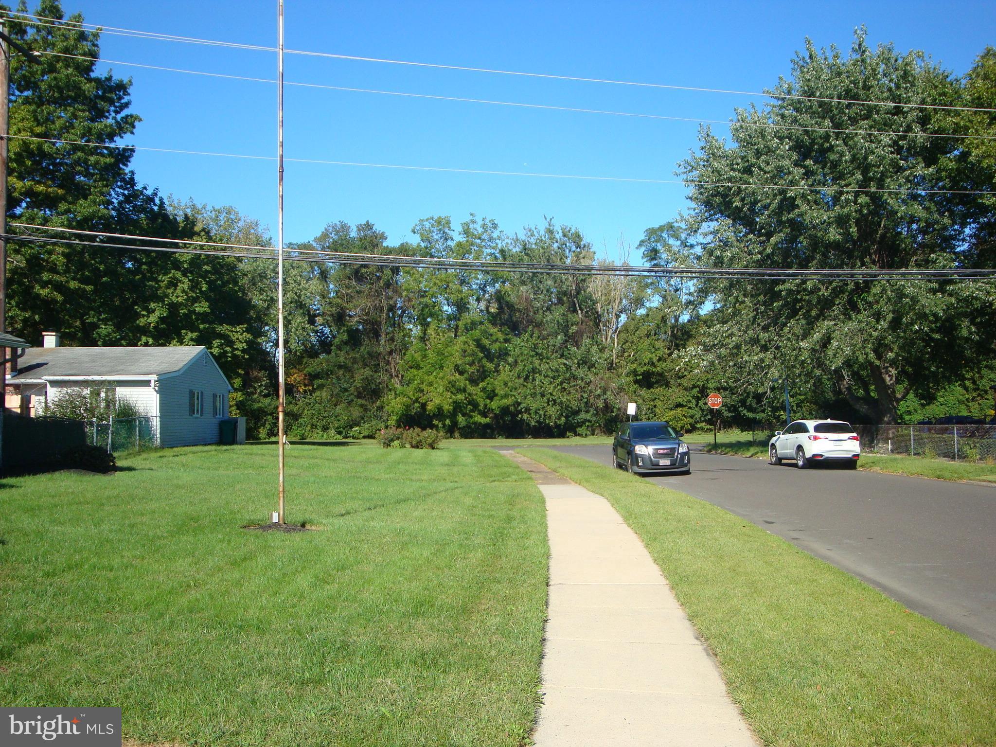 71 Incurve Road Levittown, PA 19057 - Photo 32 of 32 View down the street to open space