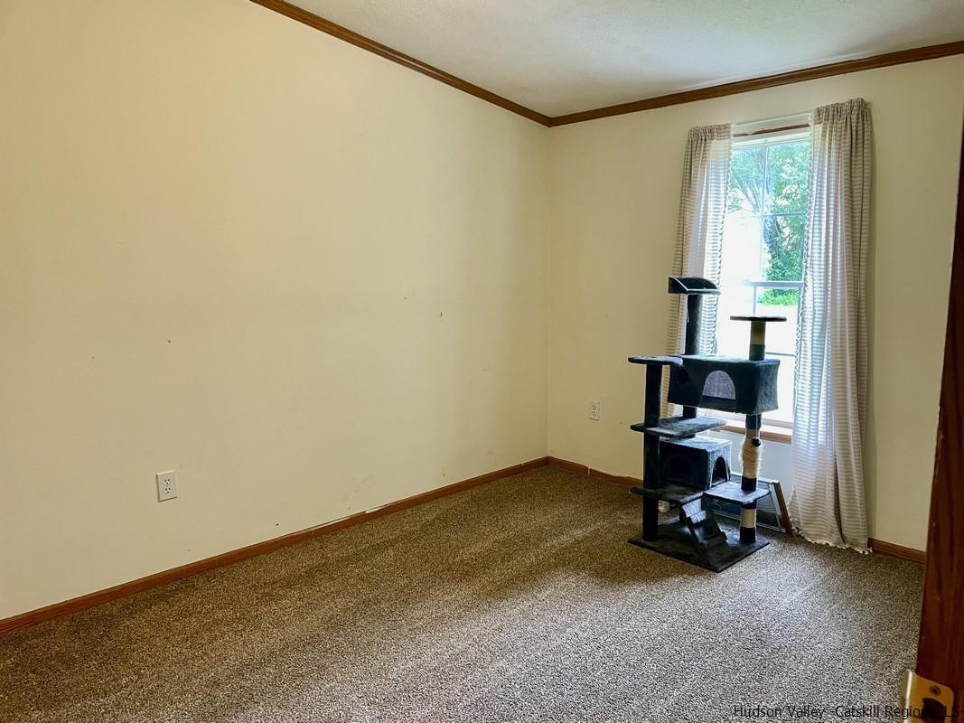 302 Springfield Hill Road Cooperstown, NY 13326 - Photo 14 of 19 a view of room with workspace and a window