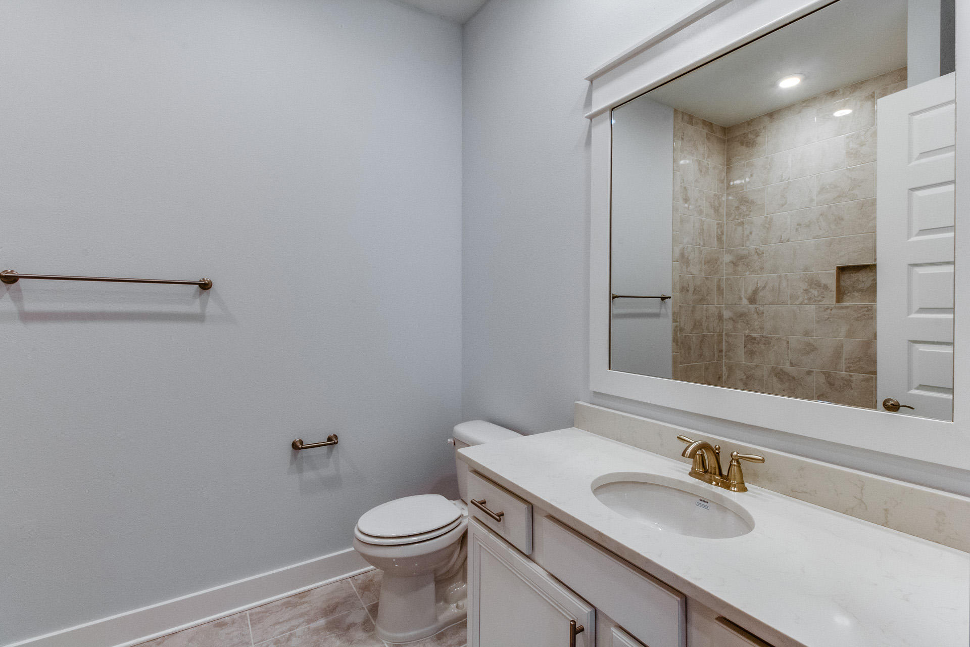 146 Pine Lands Loop Inlet Beach East, Unit A Inlet Beach, FL 32461 - Photo 29 of 42 a bathroom with a sink toilet and shower