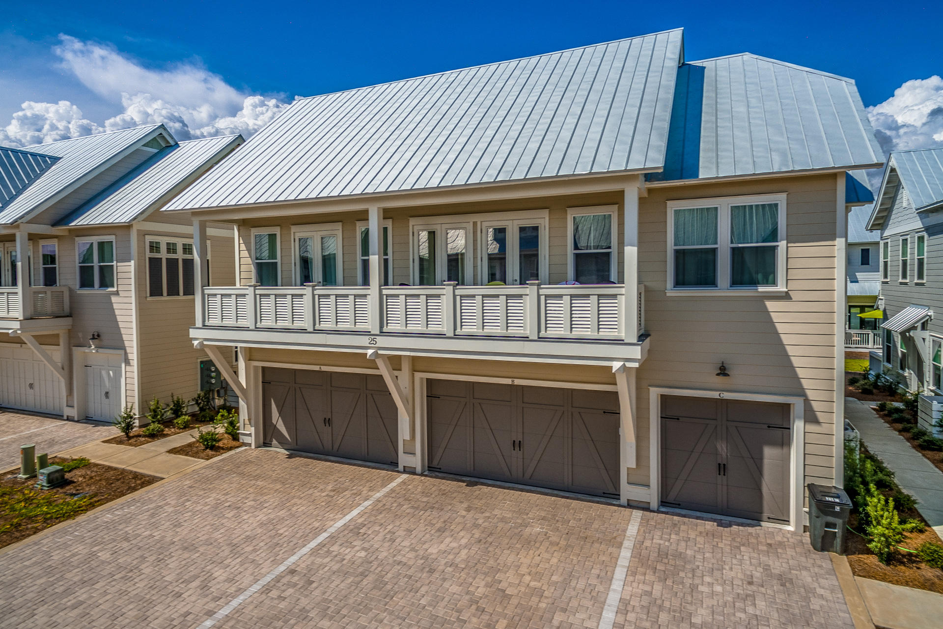 146 Pine Lands Loop Inlet Beach East, Unit A Inlet Beach, FL 32461 - Photo 42 of 42 a front view of a house with a yard